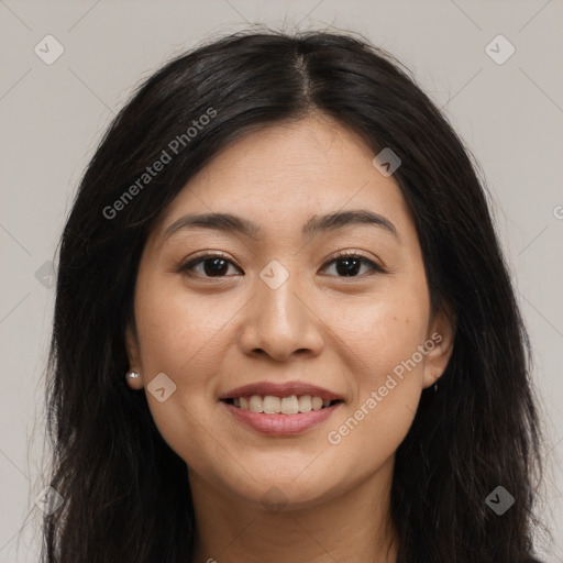 Joyful asian young-adult female with long  brown hair and brown eyes