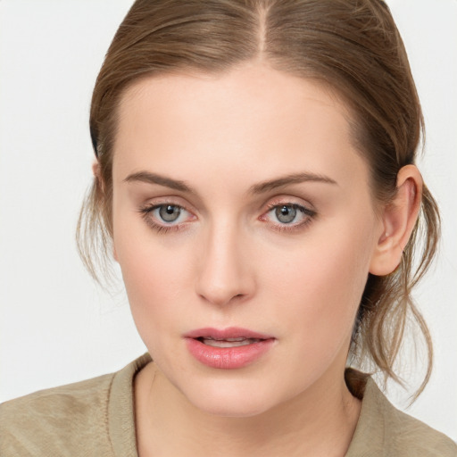 Neutral white young-adult female with medium  brown hair and blue eyes