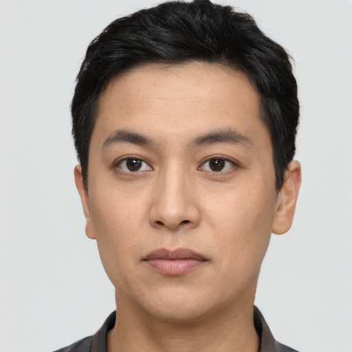 Neutral asian young-adult male with short  black hair and brown eyes