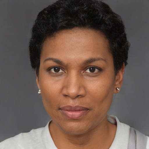 Neutral black adult female with short  black hair and brown eyes