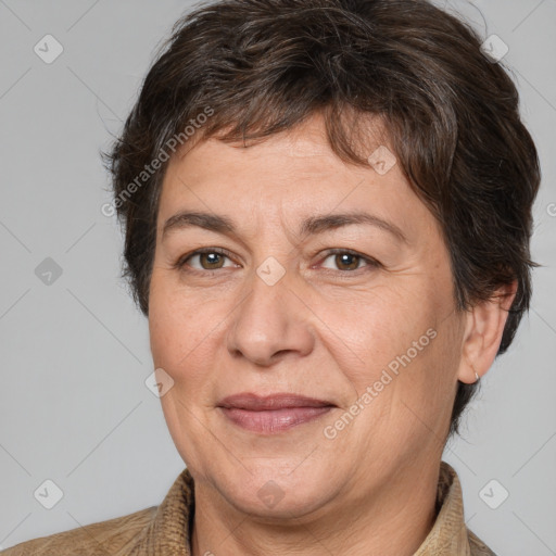 Joyful white adult female with short  brown hair and brown eyes