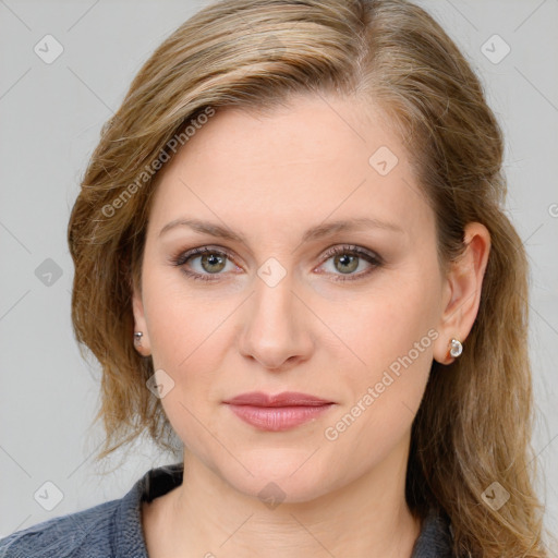 Joyful white young-adult female with medium  brown hair and blue eyes