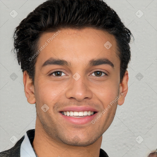 Joyful white young-adult male with short  black hair and brown eyes