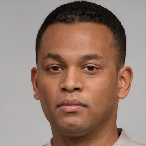 Neutral black young-adult male with short  brown hair and brown eyes
