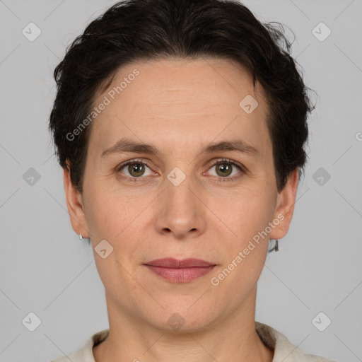 Joyful white adult female with short  brown hair and brown eyes