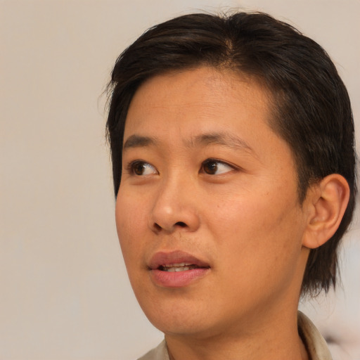Neutral asian young-adult male with short  brown hair and brown eyes