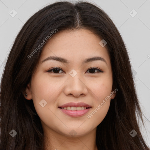 Joyful asian young-adult female with long  brown hair and brown eyes