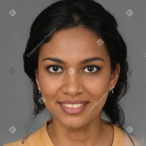 Joyful black young-adult female with long  black hair and brown eyes