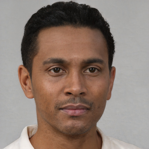 Neutral black young-adult male with short  brown hair and brown eyes