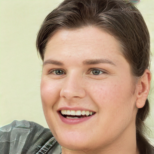 Joyful white young-adult female with medium  brown hair and green eyes