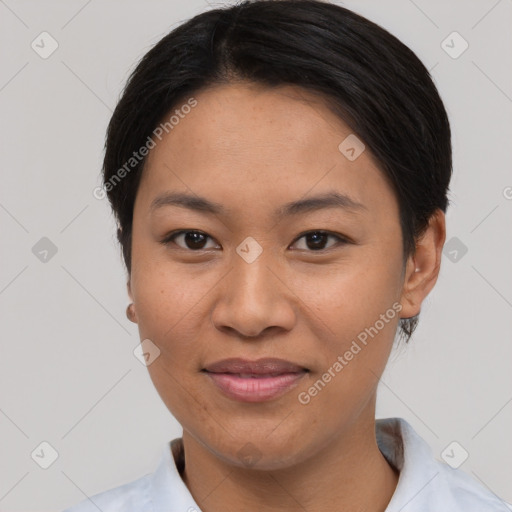 Joyful asian young-adult female with short  black hair and brown eyes