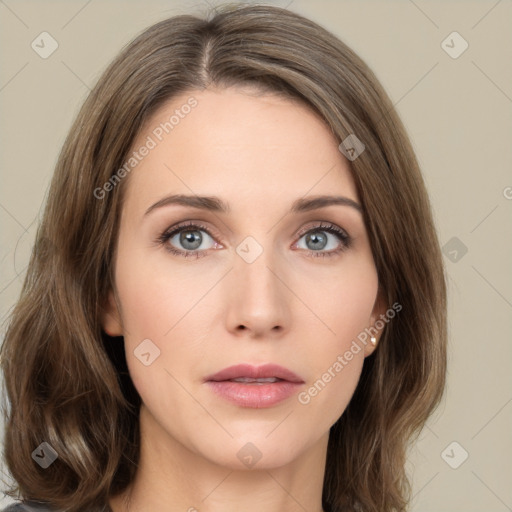 Neutral white young-adult female with long  brown hair and green eyes