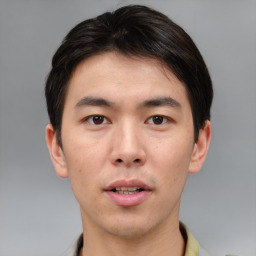 Neutral asian young-adult male with short  brown hair and brown eyes