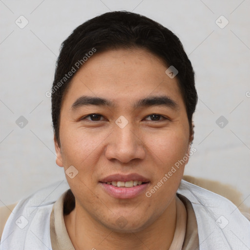 Joyful asian young-adult male with short  black hair and brown eyes