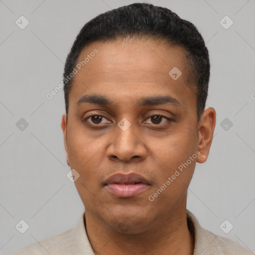 Neutral latino young-adult male with short  black hair and brown eyes