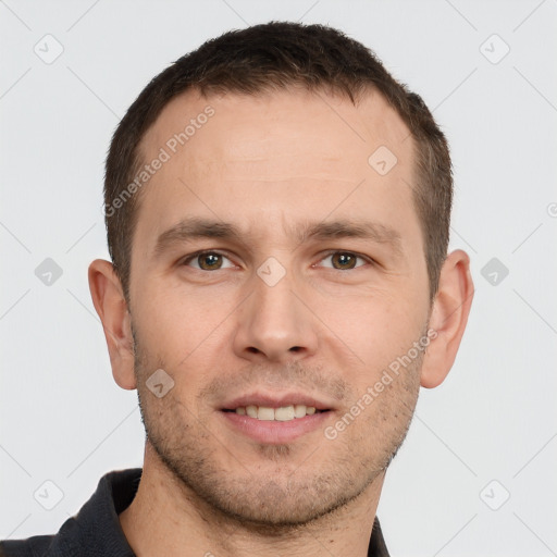 Joyful white young-adult male with short  brown hair and grey eyes