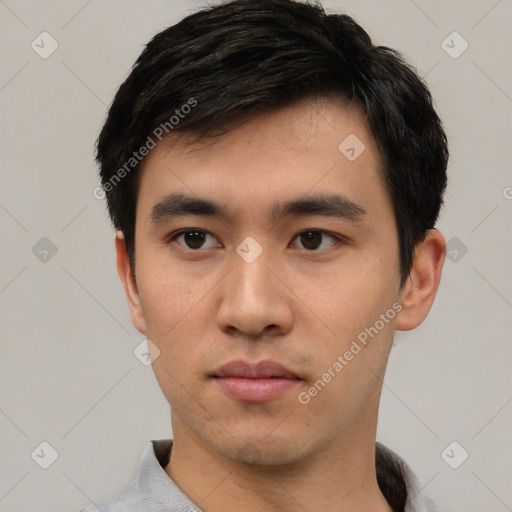 Neutral asian young-adult male with short  black hair and brown eyes