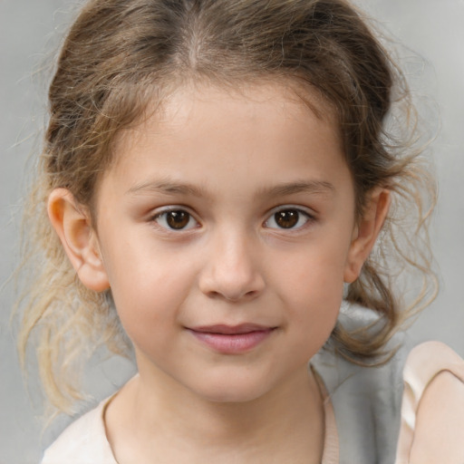 Joyful white child female with medium  brown hair and brown eyes