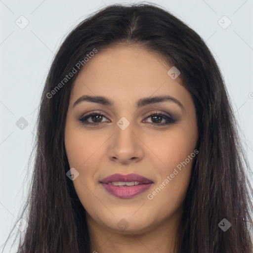 Joyful latino young-adult female with long  brown hair and brown eyes