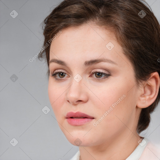 Neutral white young-adult female with medium  brown hair and brown eyes