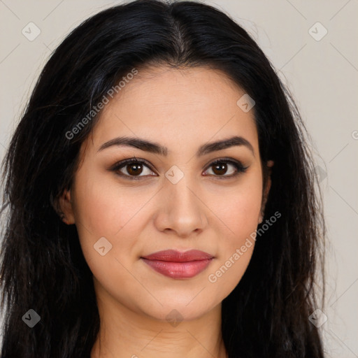 Joyful latino young-adult female with long  brown hair and brown eyes