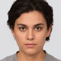 Neutral white young-adult female with medium  brown hair and brown eyes