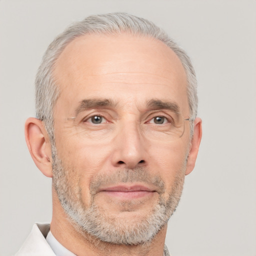 Neutral white middle-aged male with short  gray hair and brown eyes