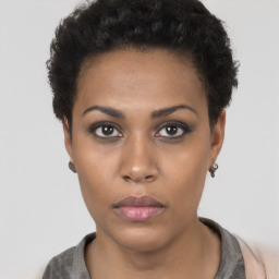 Neutral black young-adult female with short  black hair and brown eyes