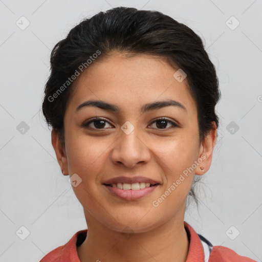 Joyful latino young-adult female with short  brown hair and brown eyes