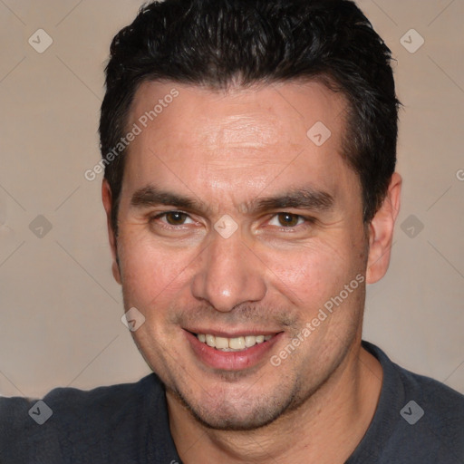 Joyful white adult male with short  black hair and brown eyes