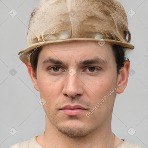 Neutral white young-adult male with short  brown hair and grey eyes