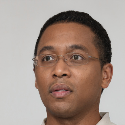 Neutral black young-adult male with short  black hair and brown eyes