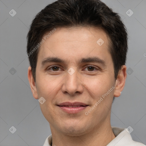 Joyful white young-adult male with short  brown hair and brown eyes