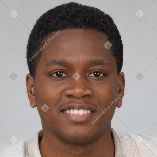 Joyful black young-adult male with short  brown hair and brown eyes