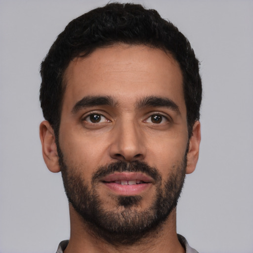 Neutral latino young-adult male with short  black hair and brown eyes
