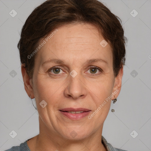 Joyful white adult female with short  brown hair and grey eyes