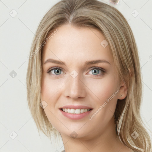 Joyful white young-adult female with medium  brown hair and blue eyes