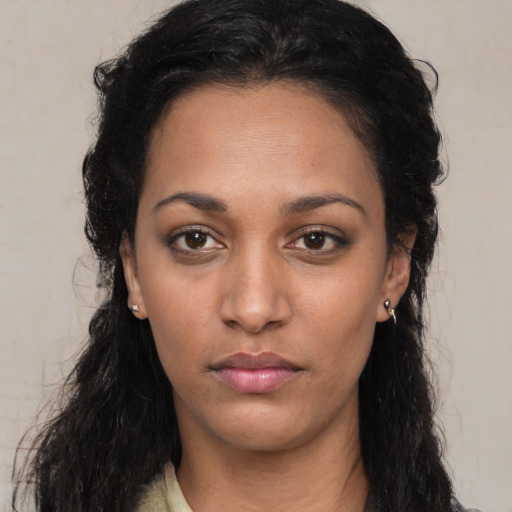 Neutral latino young-adult female with long  black hair and brown eyes