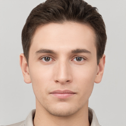 Neutral white young-adult male with short  brown hair and brown eyes