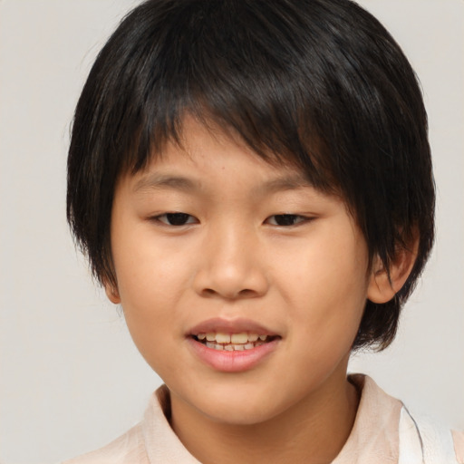 Joyful asian child female with medium  brown hair and brown eyes