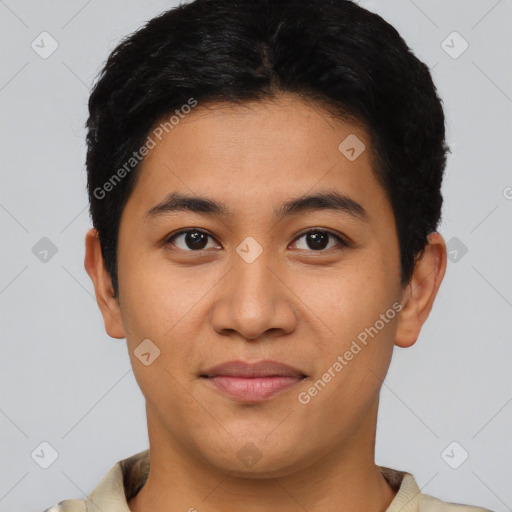 Joyful asian young-adult male with short  brown hair and brown eyes