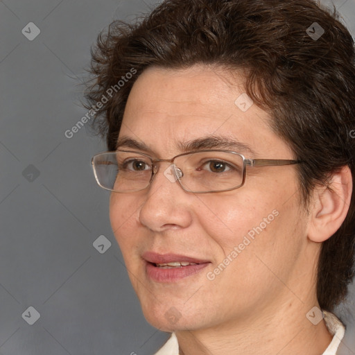 Joyful white adult male with medium  brown hair and brown eyes