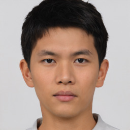 Neutral asian young-adult male with short  brown hair and brown eyes