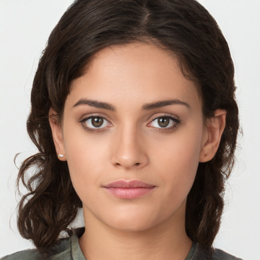 Neutral white young-adult female with medium  brown hair and brown eyes