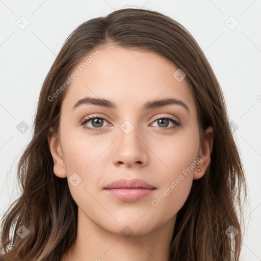 Neutral white young-adult female with long  brown hair and brown eyes