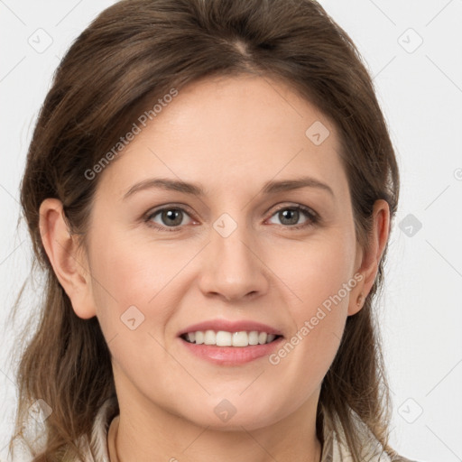 Joyful white young-adult female with medium  brown hair and grey eyes