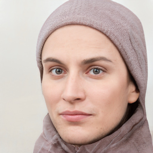 Neutral white young-adult female with short  brown hair and grey eyes