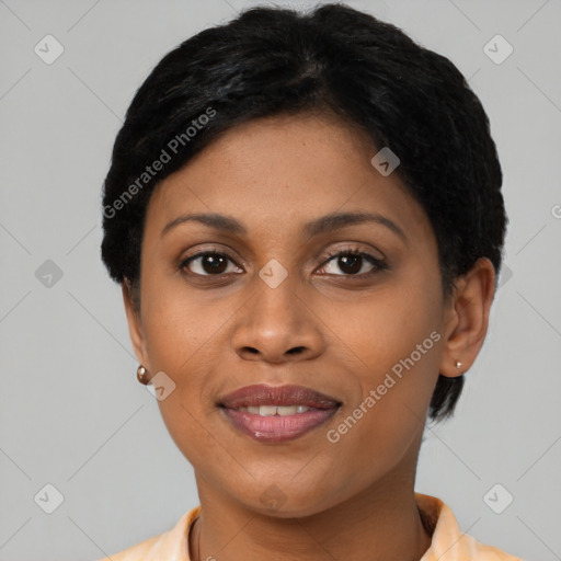 Joyful latino young-adult female with short  brown hair and brown eyes