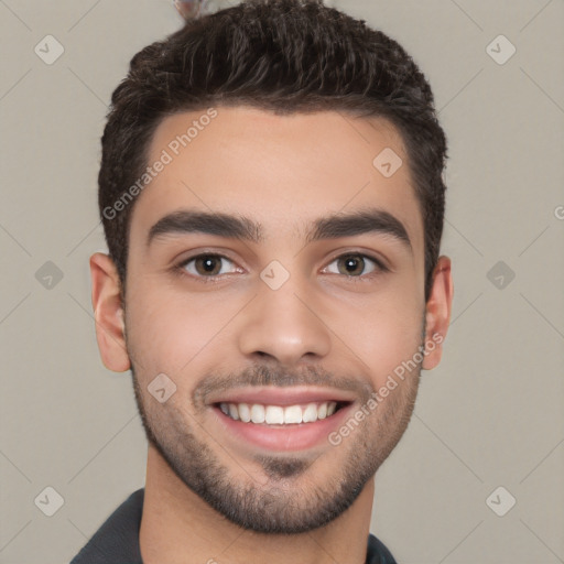 Joyful white young-adult male with short  black hair and brown eyes