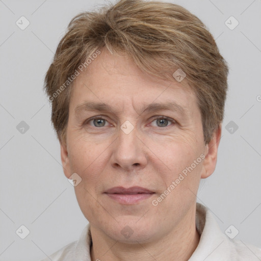 Joyful white adult male with short  brown hair and grey eyes